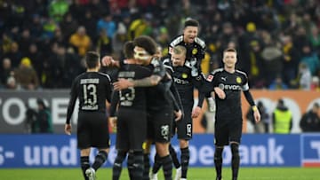 AUGSBURG, GERMANY - JANUARY 18: Players of Borussia Dortmund celebrate after their team's fourth goal during the Bundesliga match between FC Augsburg and Borussia Dortmund at WWK-Arena on January 18, 2020 in Augsburg, Germany. (Photo by Sebastian Widmann/Bongarts/Getty Images)