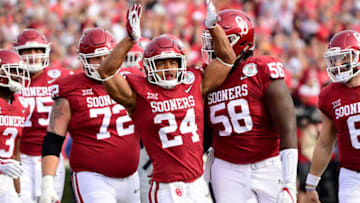 PASADENA, CA - JANUARY 01: Running back Rodney Anderson #24 of the Oklahoma Sooners celebrates after scoring on a nine-yard touchdown run in the first quarter against the Georgia Bulldogs in the 2018 College Football Playoff Semifinal at the Rose Bowl Game presented by Northwestern Mutual at the Rose Bowl on January 1, 2018 in Pasadena, California. (Photo by Harry How/Getty Images)