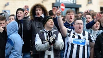 NEWCASTLE UPON TYNE, ENGLAND - FEBRUARY 01: Newcastle fans await the arrival of the travelling Sunderland fans, who will escorted into the stadium by police prior to kickoff during the Barclays Premier League match between Newcastle United and Sunderland at St James' Park on February 1, 2014 in Newcastle upon Tyne, England. (Photo by Michael Regan/Getty Images)