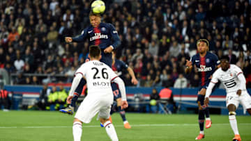 PARIS, FRANCE - MAY 12: (L-R) Jeremy Gelin of Stade Rennes, Kylian Mbappe of Paris Saint Germain during the French League 1 match between Paris Saint Germain v Rennes at the Parc des Princes on May 12, 2018 in Paris France (Photo by Jean Marie Hervio/Soccrates/Getty Images)