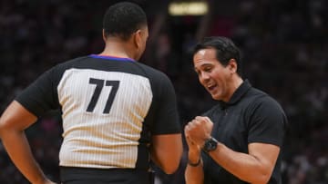 Head Coach Erik Spoelstra of the Miami Heat talks with referee Karl Lane #77 during a time out(Photo by Eric Espada/Getty Images)