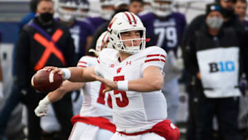 Nov 21, 2020; Evanston, Illinois, USA; Wisconsin Badgers quarterback Graham Mertz (5) passes against the Northwestern Wildcats during the first half at Ryan Field. Mandatory Credit: David Banks-USA TODAY Sports