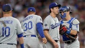 DENVER, COLORADO - JULY 29: Starting pitcher Kenta Maeda #18 of the Los Angeles Dodgers leaves the game in the fifth inning against the Colorado Rockies at Coors Field on July 29, 2019 in Denver, Colorado. (Photo by Matthew Stockman/Getty Images)