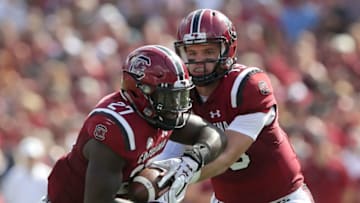 COLUMBIA, SC - SEPTEMBER 23: Jake Bentley #19 hands the ball off to teammate Ty'Son Williams #27 of the South Carolina Gamecocks during their game at Williams-Brice Stadium on September 23, 2017 in Columbia, South Carolina. (Photo by Streeter Lecka/Getty Images)
