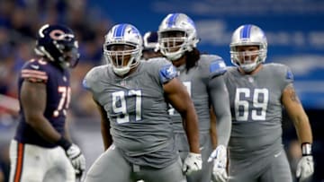 DETROIT, MI - DECEMBER 16: Detroit Lions defensive tackle Akeem Spence #97 celebrates a defensive play against the Chicago Bears during the second half at Ford Field on December 16, 2017 in Detroit, Michigan. (Photo by Gregory Shamus/Getty Images)
