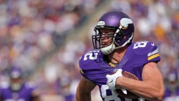 Sep 14, 2014; Minneapolis, MN, USA; Minnesota Vikings tight end Kyle Rudolph (82) carries the ball during the fourth quarter against the New England Patriots at TCF Bank Stadium. The Patriots defeated the Vikings 30-7. Mandatory Credit: Brace Hemmelgarn-USA TODAY Sports