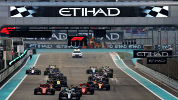 ABU DHABI, UNITED ARAB EMIRATES - DECEMBER 01: Lewis Hamilton of Great Britain driving the (44) Mercedes AMG Petronas F1 Team Mercedes W10 leads the field at the start during the F1 Grand Prix of Abu Dhabi at Yas Marina Circuit on December 01, 2019 in Abu Dhabi, United Arab Emirates. (Photo by Mark Thompson/Getty Images)