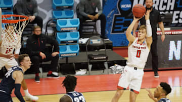 Mar 19, 2021; Bloomington, Indiana, USA; Texas Tech Red Raiders guard Mac McClung (0) shoots against the Utah State Aggies during the second half in the first round of the 2021 NCAA Tournament at Simon Skjodt Assembly Hall. Mandatory Credit: Robert Goddin-USA TODAY Sports