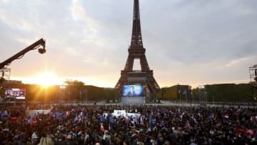 PARIS, FRANCE - APRIL 24: Emmanuel Macron's victory celebration at the Champ de Mars near the Eiffel Tower on April 24, 2022 in Paris, France. France's centrist incumbent President Emmanuel Macron beats his far-right rival Marine Le Pen in the presidential second round for a second five-year term as President. (Photo by Jean Catuffe/Getty Images)