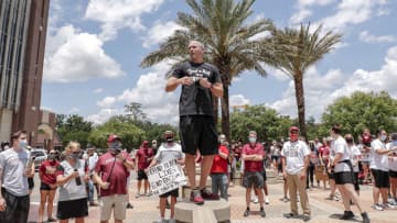 TALLAHASSEE, FL - JUNE 13: Head Coach Mike Norvell of the Florida State Football Team speaks with fans before a unity walk on June 13, 2020 in Tallahassee, Florida. Florida State players and members of the football coaching staff led fans and supporters on a unity walk from the Doak Campbell Stadium on the Florida State University campus to the state capitol building in support of the Black Lives Matter movement. Protests erupted across the nation after George Floyd died in police custody in Minneapolis, Minnesota on May 25th. (Photo by Don Juan Moore/Getty Images)