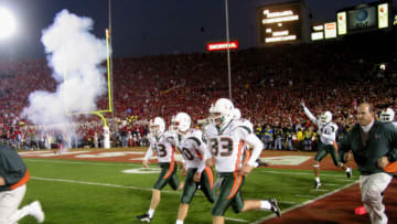 3 Jan 2002: University of Miami players run onto the field prior to the Rose Bowl National Championship Game versus Nebraska at the Rose Bowl in Pasadena, California. Miami won 37-14. DIGITAL IMAGE Mandatory Credit: Stephen Dunn/Getty Images