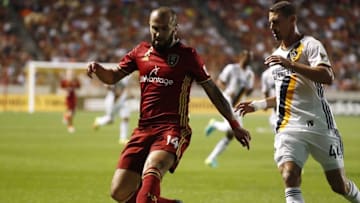 Sep 7, 2016; Sandy, UT, USA; Real Salt Lake forward Yura Movsisyan (14) and Los Angeles Galaxy defender Daniel Steres (44) battle for the ball in the first half at Rio Tinto Stadium. Mandatory Credit: Jeff Swinger-USA TODAY Sports