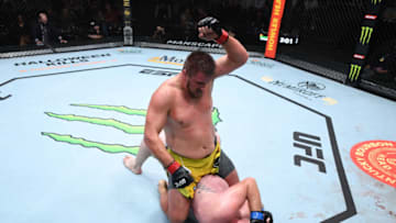 LAS VEGAS, NEVADA - OCTOBER 09: In this UFC handout, Alexandr Romanov of Moldova (top) punches Jared Vanderaa in their heavyweight bout during the UFC Fight Night event at UFC APEX on October 09, 2021 in Las Vegas, Nevada. (Photo by Josh Hedges/Zuffa LLC/Getty Images)