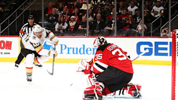 NEWARK, NEW JERSEY - DECEMBER 14: Ryan Carpenter #40 of the Vegas Golden Knights shoots against Cory Schneider #35 of the New Jersey Devils during their game at the Prudential Center on December 14, 2018 in Newark, New Jersey. (Photo by Al Bello/Getty Images)