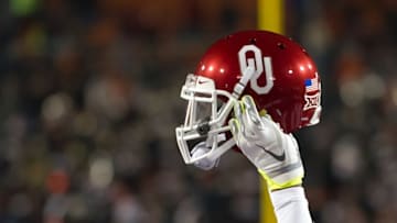 Nov 28, 2015; Stillwater, OK, USA; Oklahoma Sooners line up against the Oklahoma State Cowboys as they prepare to snap the ball at Boone Pickens Stadium. The Sooners defeated the Cowboys 58-23. Mandatory Credit: Mark J. Rebilas-USA TODAY Sports