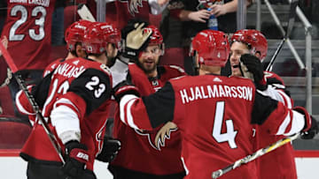 GLENDALE, AZ - OCTOBER 30: Brad Richardson #15 of the Arizona Coyotes celebrates with teammates Oliver Ekman-Larsson #23, Niklas Hjalmarsson #4 and Nick Cousins #25 after his first period goal against the Ottawa Senators at Gila River Arena on October 30, 2018 in Glendale, Arizona. (Photo by Norm Hall/NHLI via Getty Images)