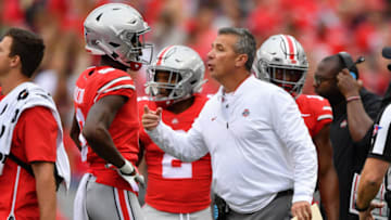 COLUMBUS, OH - SEPTEMBER 22: Head Coach Urban Meyer of the Ohio State Buckeyes sends instructions to his team during a game against the Tulane Green Wave at Ohio Stadium on September 22, 2018 in Columbus, Ohio. (Photo by Jamie Sabau/Getty Images)