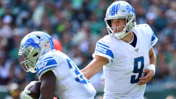 PHILADELPHIA, PENNSYLVANIA - SEPTEMBER 22: Matthew Stafford #9 hands off to Kerryon Johnson #33 of the Detroit Lions during their game against the Philadelphia Eagles at Lincoln Financial Field on September 22, 2019 in Philadelphia, Pennsylvania. The Lions won 27-24. (Photo by Emilee Chinn/Getty Images)