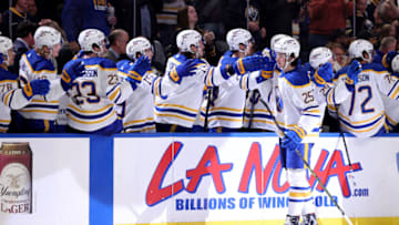 Apr 29, 2022; Buffalo, New York, USA; Buffalo Sabres defenseman Owen Power (25) celebrates his goal with teammates during the third period against the Chicago Blackhawks at KeyBank Center. Mandatory Credit: Timothy T. Ludwig-USA TODAY Sports