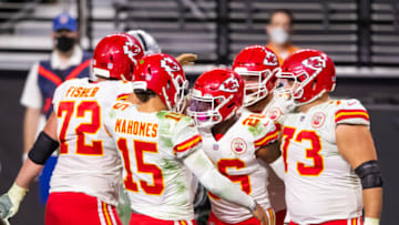 Nov 22, 2020; Paradise, Nevada, USA; Kansas City Chiefs quarterback Patrick Mahomes (15) celebrates a touchdown with running back Le'Veon Bell (26) against the Las Vegas Raiders in the fourth quarter at Allegiant Stadium. Mandatory Credit: Mark J. Rebilas-USA TODAY Sports