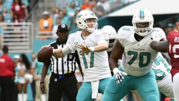 MIAMI GARDENS, FL - DECEMBER 11: Ryan Tannehill #17 of the Miami Dolphins throws a touchdown in the 1st quarter against the Arizona Cardinals at Hard Rock Stadium on December 11, 2016 in Miami Gardens, Florida. (Photo by Eric Espada/Getty Images)