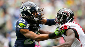 SEATTLE, WA - OCTOBER 16: Cornerback Richard Sherman #25 of the Seattle Seahawks defends against Wide receiver Julio Jones #11 of the Atlanta Falcons at CenturyLink Field on October 16, 2016 in Seattle, Washington. (Photo by Jonathan Ferrey/Getty Images)