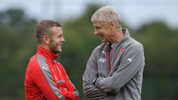ST ALBANS, ENGLAND - AUGUST 13: Arsenal manager Arsene Wenger talks to Jack Wilshere during a training session on August 13, 2016 in St Albans, England. (Photo by Stuart MacFarlane/Arsenal FC via Getty Images)