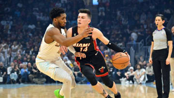 Tyler Herro #14 of the Miami Heat drives around Donovan Mitchell #45 of the Cleveland Cavaliers (Photo by Jason Miller/Getty Images)