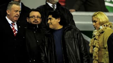 LIVERPOOL, ENGLAND - MARCH 18: Argentina Manager Diego Maradona takes his seat prior to the UEFA Europa League Round of 16, second leg match at Anfield on March 18, 2010 in Liverpool, England. (Photo by Shaun Botterill/Getty Images)