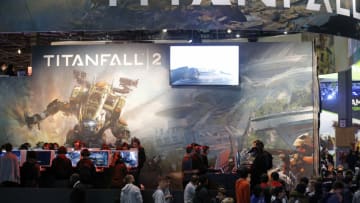 PARIS, FRANCE - OCTOBER 26: Visitors wait to play the video game 'Titanfall 2' developed by Respawn Entertainment and published by Electronic Arts during the "Paris Games Week" on October 26, 2016 in Paris, France. "Paris Games Week" is an international trade fair for video games to be held from October 26 to October 31, 2016. (Photo by Chesnot/Getty Images)