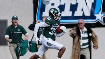 EAST LANSING, MI - OCTOBER 15: Justin Layne #39 of the Michigan State Spartans returns an interception for a touchdown against the Northwestern Wildcats during the first half at Spartan Stadium on October 15, 2016 in East Lansing, Michigan. (Photo by Duane Burleson/Getty Images)