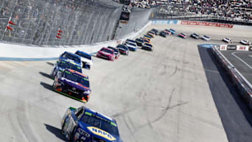DOVER, DE - OCTOBER 01: Chase Elliott, driver of the #24 Mountain Dew Chevrolet, leads a pack of cars during the Monster Energy NASCAR Cup Series Apache Warrior 400 presented by Lucas Oil at Dover International Speedway on October 1, 2017 in Dover, Delaware. (Photo by Brian Lawdermilk/Getty Images)