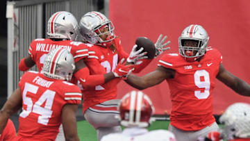 COLUMBUS, OH - NOVEMBER 21: Shaun Wade #24 of the Ohio State Buckeyes celebrates after returning an interception 36-yards for a touchdown in the third quarter against the Indiana Hoosiers at Ohio Stadium on November 21, 2020 in Columbus, Ohio. Ohio State defeated Indiana 42-35. (Photo by Jamie Sabau/Getty Images)