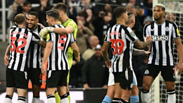 Newcastle player ratings vs Man City. Newcastle players celebrate at the final whistle in the English League Cup third round football match between Newcastle United and Manchester City at St James' Park in Newcastle-upon-Tyne, north east England on September 27, 2023. Newcastle won the match 1-0. (Photo by Oli SCARFF / AFP) / RESTRICTED TO EDITORIAL USE. No use with unauthorized audio, video, data, fixture lists, club/league logos or 'live' services. Online in-match use limited to 120 images. An additional 40 images may be used in extra time. No video emulation. Social media in-match use limited to 120 images. An additional 40 images may be used in extra time. No use in betting publications, games or single club/league/player publications. / (Photo by OLI SCARFF/AFP via Getty Images)