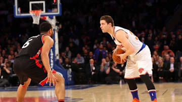 Feb 22, 2016; New York, NY, USA; New York Knicks guard Jimmer Fredette (32) works the ball during the fourth quarter against the Toronto Raptors at Madison Square Garden. Toronto Raptors won 122-95. Mandatory Credit: Anthony Gruppuso-USA TODAY Sports