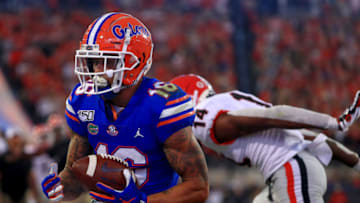 JACKSONVILLE, FLORIDA - NOVEMBER 02: Freddie Swain #16 of the Florida Gators scores a touchdown during a game against the Georgia Bulldogs on November 02, 2019 in Jacksonville, Florida. (Photo by Mike Ehrmann/Getty Images)