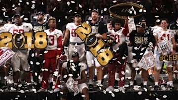 ATLANTA, GA - JANUARY 08: The Alabama Crimson Tide celebrates beating the Georgia Bulldogs in overtime and winning the CFP National Championship presented by AT&T at Mercedes-Benz Stadium on January 8, 2018 in Atlanta, Georgia. Alabama won 26-23. (Photo by Christian Petersen/Getty Images)