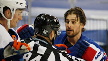 NEW YORK, NEW YORK - JANUARY 16: Brendan Smith #42 of the New York Rangers is pulled out of a scum during the first period against the New York Islanders at Madison Square Garden on January 16, 2021 in New York City. (Photo by Bruce Bennett/Getty Images)