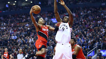 TORONTO, ON - JANUARY 07: Kent Bazemore #24 of the Portland Trail Blazers goes up for a shot as Serge Ibaka #9 of the Toronto Raptors defends during the first half of an NBA game at Scotiabank Arena on January 07, 2020 in Toronto, Canada. NOTE TO USER: User expressly acknowledges and agrees that, by downloading and or using this photograph, User is consenting to the terms and conditions of the Getty Images License Agreement. (Photo by Vaughn Ridley/Getty Images)