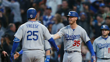 SAN FRANCISCO, CA - APRIL 30: David Freese #25 of the Los Angeles Dodgers crosses home plate and celebrates with Cody Bellinger #35 after hitting a three-run home run in the top of the fourth inning against the San Francisco Giants at Oracle Park on April 30, 2019 in San Francisco, California. (Photo by Lachlan Cunningham/Getty Images)