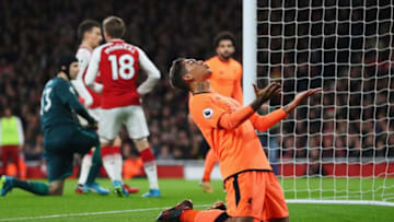LONDON, ENGLAND - DECEMBER 22: Roberto Firmino of Liverpool reacts after a missed chance during the Premier League match between Arsenal and Liverpool at Emirates Stadium on December 22, 2017 in London, England. (Photo by Catherine Ivill/Getty Images)