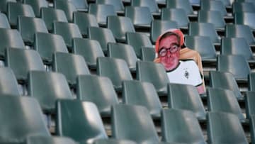 A cardboard cut-out with a portrait of a Borussia Moenchegladbach supporter is seen at the Borussia Park football stadium in Moenchengladbach, western Germany, on April 16, 2020, amid the novel coronavirus COVID-19 pandemic. - Large-scale public events such as football matches will remain banned in Germany until August 31 due to the coronavirus crisis, Berlin said on Wednesday, April 15, 2020, though it did not rule out allowing Bundesliga games to continue behind closed doors. (Photo by Ina FASSBENDER / AFP) (Photo by INA FASSBENDER/AFP via Getty Images)