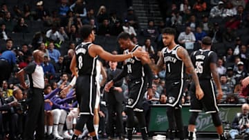 BROOKLYN, NY - OCTOBER 31: Spencer Dinwiddie #8 and D'Angelo Russell #1 of the Brooklyn Nets high five during the game against the Phoenix Suns on October 31, 2017 at Barclays Center in Brooklyn, New York. NOTE TO USER: User expressly acknowledges and agrees that, by downloading and or using this Photograph, user is consenting to the terms and conditions of the Getty Images License Agreement. Mandatory Copyright Notice: Copyright 2017 NBAE (Photo by Nathaniel S. Butler/NBAE via Getty Images)