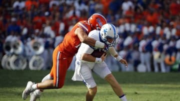 Sep 10, 2016; Gainesville, FL, USA; Florida Gators defensive lineman Jordan Sherit (17) sacks Kentucky Wildcats quarterback Drew Barker (7) during the first half at Ben Hill Griffin Stadium. Mandatory Credit: Kim Klement-USA TODAY Sports