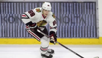 Dec 3, 2015; Ottawa, Ontario, CAN; Chicago Blackhawks left wing Patrick Kane (88) skates with the puck in the third period against the Ottawa Senators at the Canadian Tire Centre. The Senators defeated the Blackhawks 4-3 in overtime. Mandatory Credit: Marc DesRosiers-USA TODAY Sports