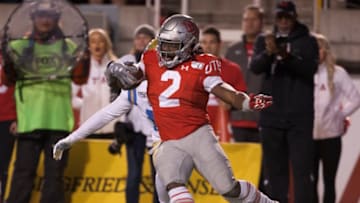 SALT LAKE CITY, UT - NOVEMBER 16: Zack Moss #2 of the Utah Utes rushes the ball against the UCLA Bruins (Photo by Chris Gardner/Getty Images)