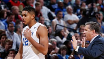 INDIANAPOLIS, IN - NOVEMBER 18: Karl-Anthony Towns #12 of the Kentucky Wildcats listens to head coach John Calipari. (Photo by Joe Robbins/Getty Images)