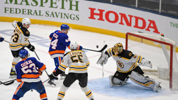 Jan 18, 2021; Uniondale, New York, USA; New York Islanders center Jean-Gabriel Pageau (44) scores the game winner on a rebound against the Boston Bruins during the third period at Nassau Veterans Memorial Coliseum. Mandatory Credit: Dennis Schneidler-USA TODAY Sports