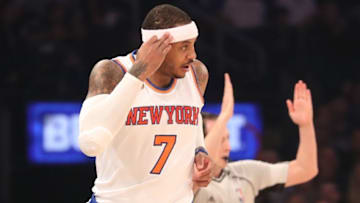 Nov 25, 2016; New York, NY, USA; New York Knicks forward Carmelo Anthony (7) gestures after scoring a three point basket during the first quarter against the Charlotte Hornets at Madison Square Garden. Mandatory Credit: Anthony Gruppuso-USA TODAY Sports