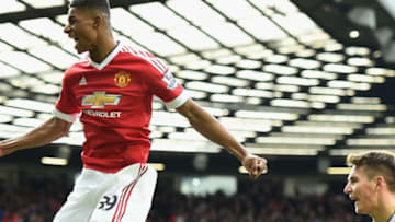 MANCHESTER, ENGLAND - FEBRUARY 28: Marcus Rashford of Manchester United celebrates scoring his opening goal during the Barclays Premier League match between Manchester United and Arsenal at Old Trafford on February 28, 2016 in Manchester, England. (Photo by Laurence Griffiths/Getty Images)